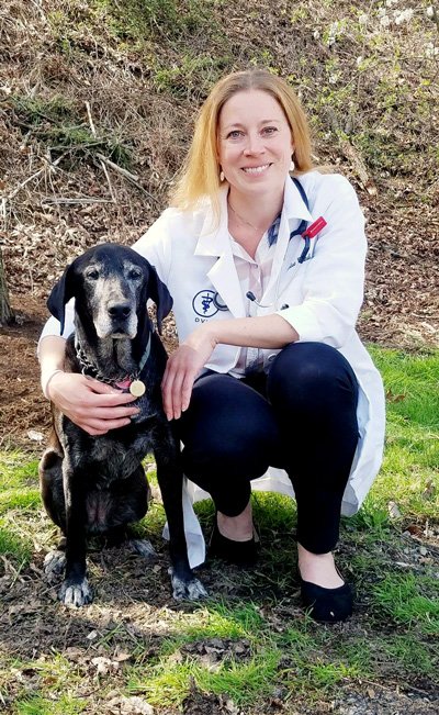 Associate Veterinarian Dr. Melissa Granell Dr. Granell with her dog Naomi